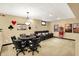 Finished basement entertainment area featuring a poker table and comfortable seating at 4704 Pearcrest Way, Greenwood, IN 46143