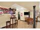 Finished basement with bar table, TV, and Foosball table at 4704 Pearcrest Way, Greenwood, IN 46143