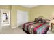 Bedroom featuring a double bed and neutral walls with an entrance way in the background at 4704 Pearcrest Way, Greenwood, IN 46143