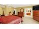 Bright and spacious bedroom featuring carpeted floors and wooden furniture at 4704 Pearcrest Way, Greenwood, IN 46143