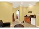 Cozy bedroom featuring a kitchenette with a sink, mini-fridge and microwave at 4704 Pearcrest Way, Greenwood, IN 46143