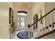 Elegant foyer with decorative rug, staircase, and a beautiful glass front door at 4704 Pearcrest Way, Greenwood, IN 46143