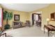 Spacious living room with neutral carpet, natural light, and an open floorplan at 4704 Pearcrest Way, Greenwood, IN 46143