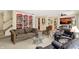 The living room boasts an open floor plan, complete with a built-in bookcase and easy access to the kitchen at 4704 Pearcrest Way, Greenwood, IN 46143
