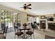 Open-concept breakfast area flows into the living room and provides access to a patio with backyard views at 4704 Pearcrest Way, Greenwood, IN 46143