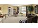 Cozy living room featuring large windows and neutral carpet at 4704 Pearcrest Way, Greenwood, IN 46143