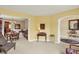 Open-concept living room with views of dining room and entry at 4704 Pearcrest Way, Greenwood, IN 46143