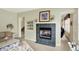 Bright living room with fireplace, built-in shelves and comfortable seating at 4704 Pearcrest Way, Greenwood, IN 46143