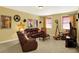 Upstairs living room featuring couches, TV, and movie decor at 4704 Pearcrest Way, Greenwood, IN 46143