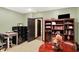 Home office space with built in shelving, storage, and large table at 4704 Pearcrest Way, Greenwood, IN 46143