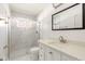 Modern bathroom with glass enclosed shower and updated vanity at 4904 E 14Th St, Indianapolis, IN 46201