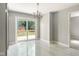 Bright, updated dining area boasts access to a backyard deck at 4904 E 14Th St, Indianapolis, IN 46201