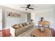 Bright living room features hardwood floors, comfortable seating, and stylish decor at 4904 E 14Th St, Indianapolis, IN 46201