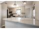 Stylish kitchen featuring white cabinets, granite countertops, subway tile backsplash and stainless steel appliances at 5660 Crittenden Ave, Indianapolis, IN 46220