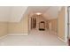 Spacious bonus room with an exercise machine and carpeting at 6118 Yellow Birch Ct, Avon, IN 46123