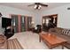 Spacious living room featuring comfortable seating, natural light, and an open layout, ideal for entertaining at 6118 Yellow Birch Ct, Avon, IN 46123