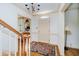 Elegant foyer with hardwood floors, a stylish area rug, and a classic entry door at 6280 N Chester Ave, Indianapolis, IN 46220