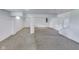 Basement with neutral carpet, white walls and stairs leading to the upper level at 629 E 25Th St, Indianapolis, IN 46205