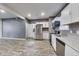 Modern kitchen with stainless steel appliances and granite countertops at 629 E 25Th St, Indianapolis, IN 46205