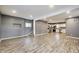 Spacious living room area featuring stylish flooring and neutral paint palette at 629 E 25Th St, Indianapolis, IN 46205