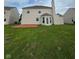 Spacious backyard featuring a deck, providing an inviting outdoor area perfect for entertaining at 6632 Coppel Ct, Indianapolis, IN 46259