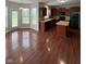Kitchen and dining area with hardwood floors, wooden cabinets and stainless steel appliances at 6632 Coppel Ct, Indianapolis, IN 46259