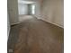 Spacious and open living room with neutral carpet at 6632 Coppel Ct, Indianapolis, IN 46259