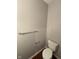 Powder room featuring a toilet, towel rack and neutral wall color at 6632 Coppel Ct, Indianapolis, IN 46259