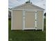 Outdoor storage shed with white trim and neutral siding, providing practical space for yard equipment at 6632 Coppel Ct, Indianapolis, IN 46259