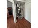 Utility closet featuring HVAC system, water heater and hardwood flooring at 6632 Coppel Ct, Indianapolis, IN 46259