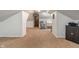 Finished attic with carpet, offering versatile space for a den, playroom, or additional living area at 718 E Washington St, Lebanon, IN 46052