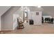 Spacious finished attic with a rocking chair and charming architectural details for a flexible living area at 718 E Washington St, Lebanon, IN 46052