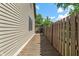 Long shot of wooden deck, next to fence, with hot tub at 718 E Washington St, Lebanon, IN 46052