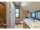 Charming bathroom with vanity, complemented by natural light and classic fixtures for a soothing ambiance at 718 E Washington St, Lebanon, IN 46052