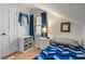Comfortable bedroom features a cozy space, slanted ceiling and bedside storage at 718 E Washington St, Lebanon, IN 46052