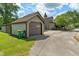 Exterior view of detached garage with gabled roof and driveway at 718 E Washington St, Lebanon, IN 46052
