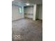 Carpeted bedroom featuring closet space for storage and organization, and a window for natural light at 7529 N Green Meadows, Fairland, IN 46126