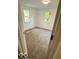 An inside shot of a carpeted bedroom with two windows for natural light at 7529 N Green Meadows, Fairland, IN 46126