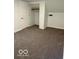 Bedroom features neutral walls, updated trim and soft carpet flooring at 7529 N Green Meadows, Fairland, IN 46126