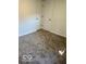 Carpeted bedroom featuring two white doors, offering privacy and access to other areas of the home at 7529 N Green Meadows, Fairland, IN 46126