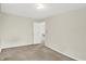 Neutral carpeted bedroom featuring ample natural light at 8212 Twin River Dr, Indianapolis, IN 46239