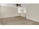Spacious living room with ceiling fan and natural lighting at 8212 Twin River Dr, Indianapolis, IN 46239