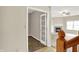 Spacious living room boasts neutral walls, carpet flooring, fireplace, and open doorway to adjacent room at 8212 Twin River Dr, Indianapolis, IN 46239
