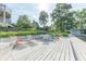 Spacious dock features outdoor seating and entertaining space, perfect for relaxing by the water at 9172 W Tulip Dr, Columbus, IN 47201