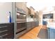 Stylish kitchen with built-in oven, sleek appliances, and ample cabinet space at 9172 W Tulip Dr, Columbus, IN 47201