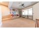 Cozy seating arrangement in the living room with natural light streaming in from the large window at 9172 W Tulip Dr, Columbus, IN 47201