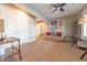 Cozy seating arrangement in the living room with a view of the entrance hallway and closet at 9172 W Tulip Dr, Columbus, IN 47201