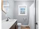 Bathroom featuring a single sink vanity and a full bathtub with a shower curtain at 9267 N State Road 135, Morgantown, IN 46160