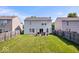 Backyard with lush green grass and a small patio area great for relaxation at 9497 W Stargazer Dr, Pendleton, IN 46064