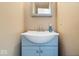 Bathroom with a blue vanity, white countertop, and simple faucet design at 9497 W Stargazer Dr, Pendleton, IN 46064
